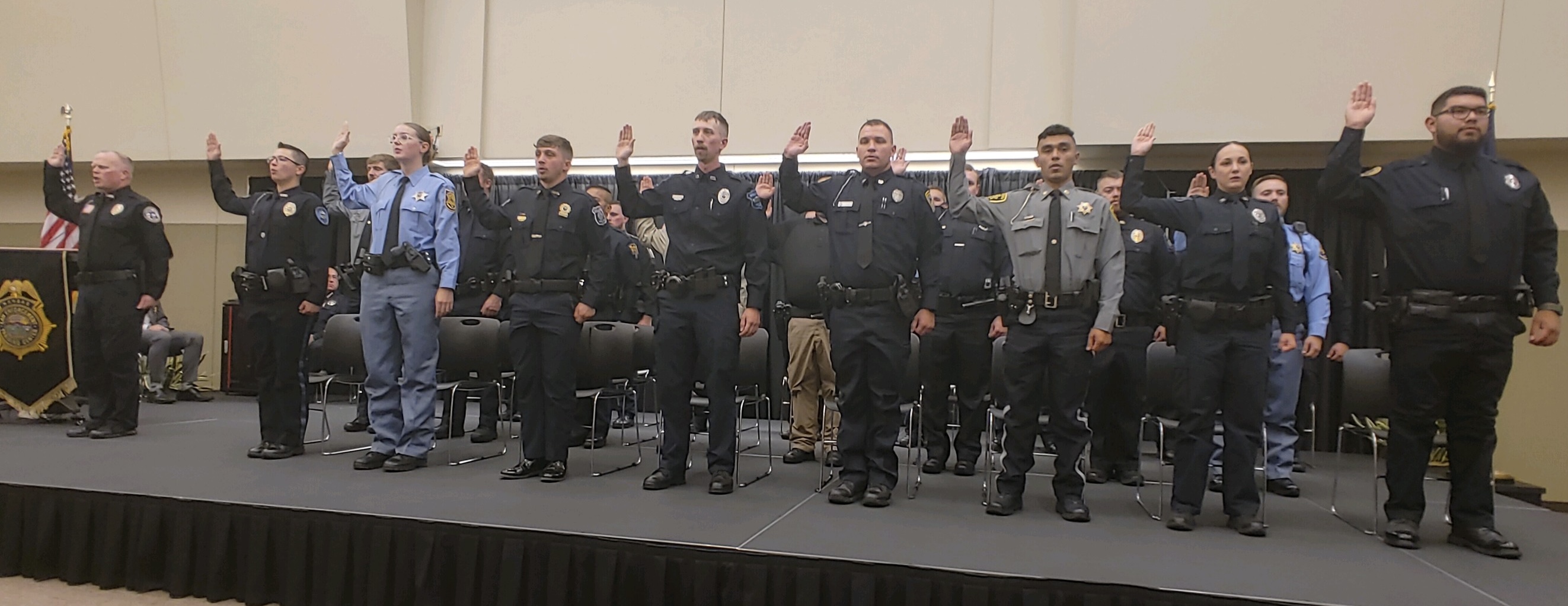 The 299th basic training class recites the oath of office.