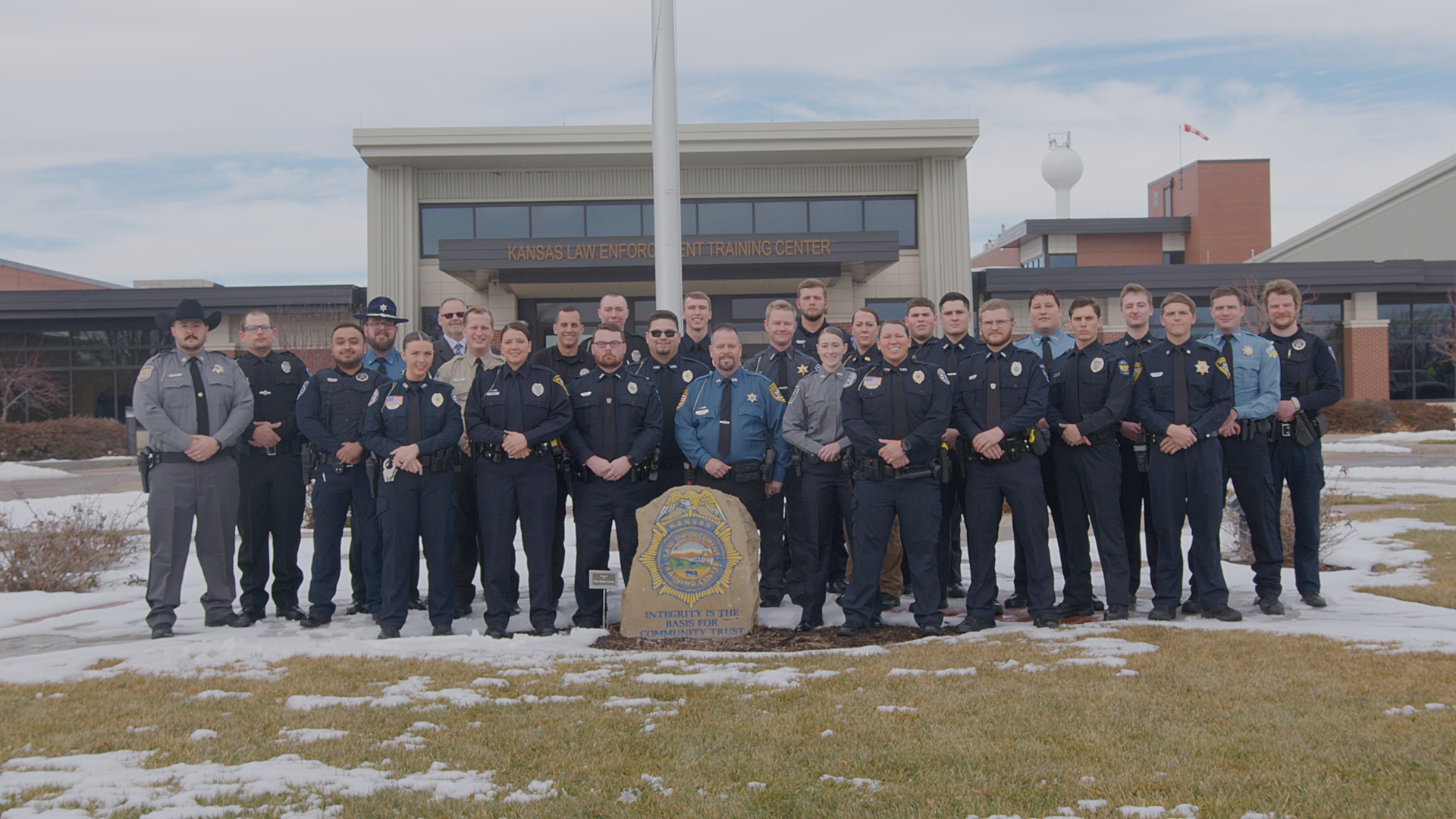 335 class in front of flag pole