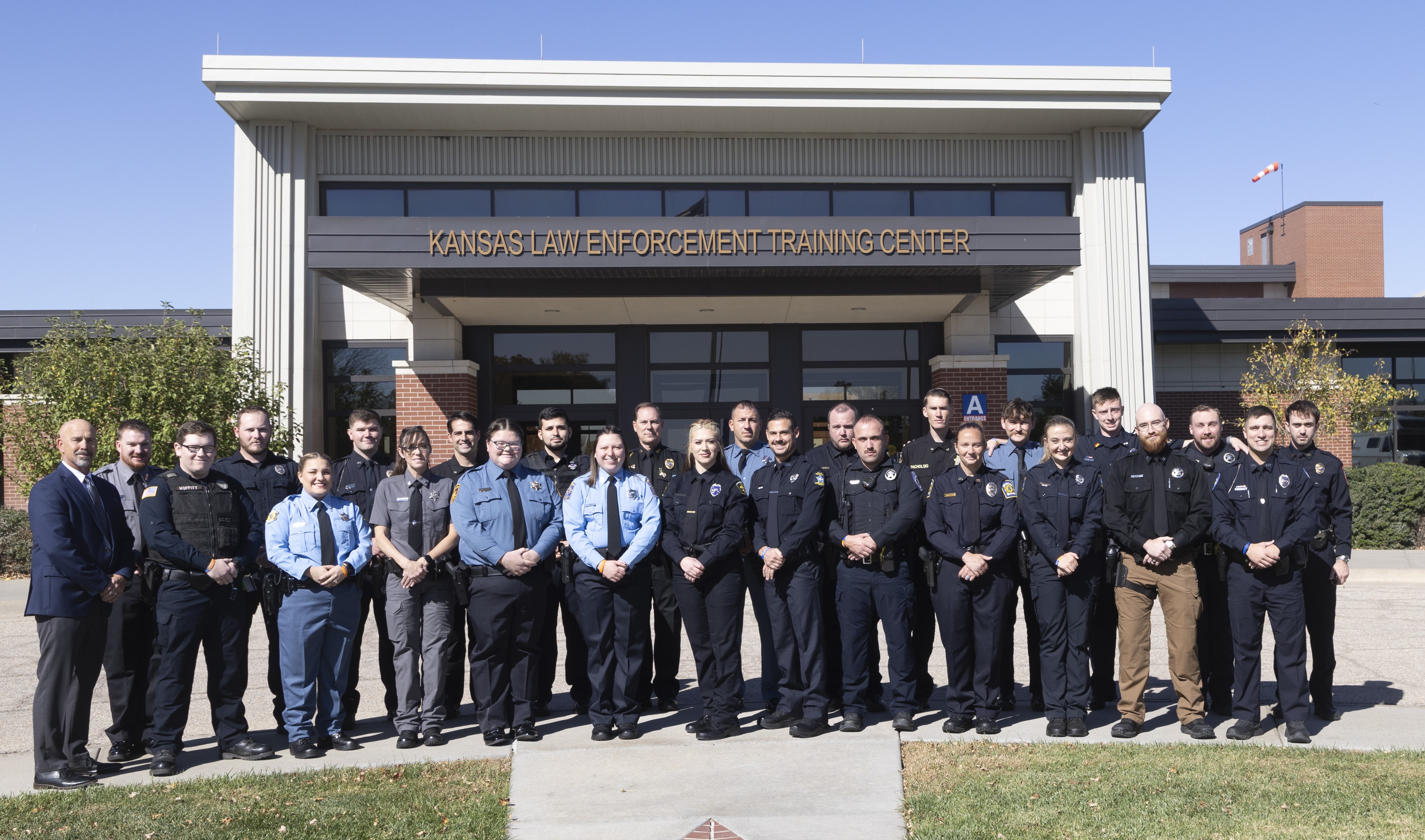 332 class in front of building