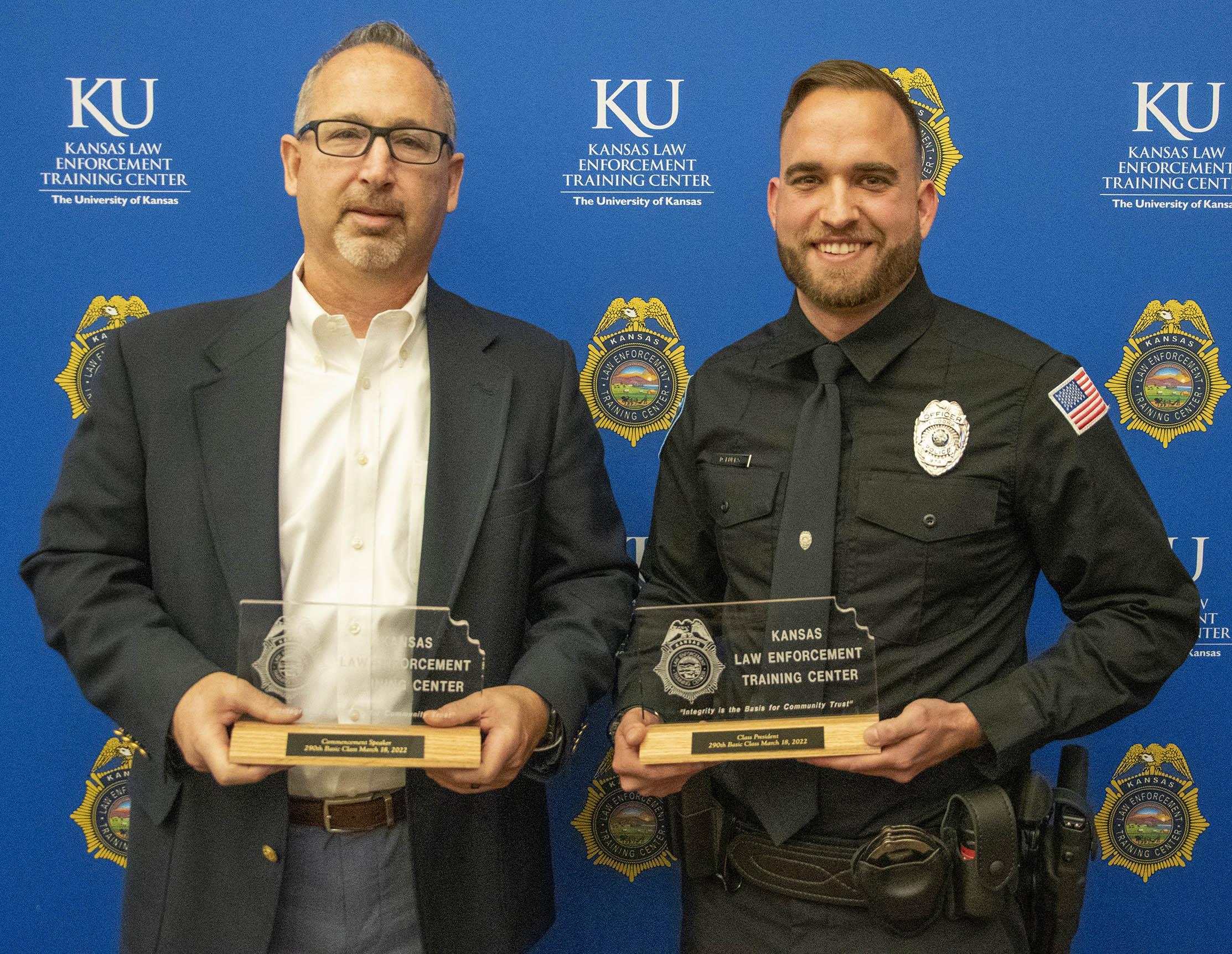 "Wes Lovett, Chief of Police for the Eudora Police Department, stands with his newest graduate and class president for the 290 basic training class, Officer Daniel Fulks"
