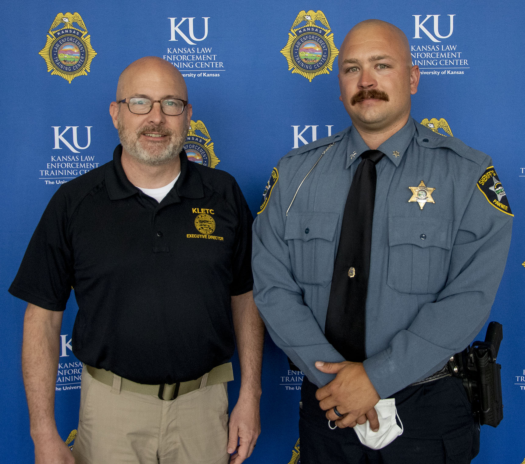 KLETC Executive Director Darin Beck and the 278 Class President Nicholas Delaney.