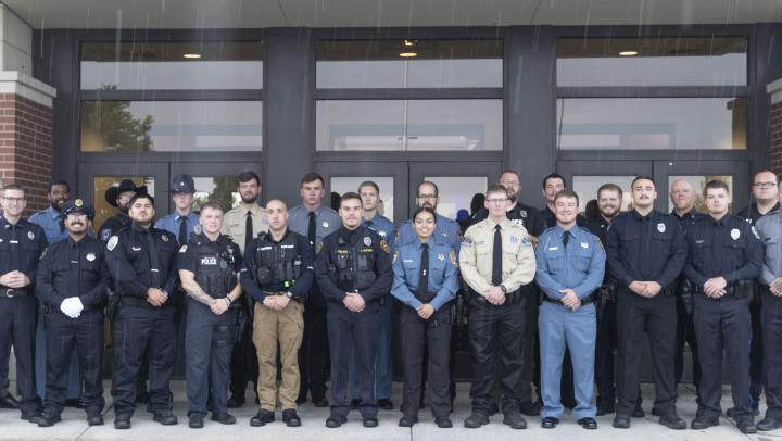 329 class in front of building