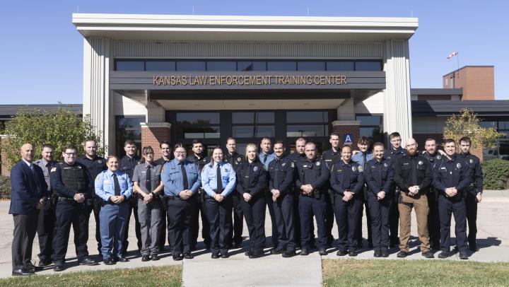 332 class in front of building